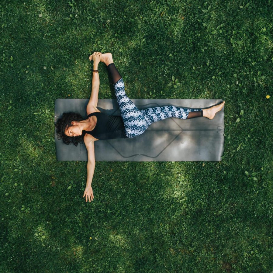 Woman doing Yoga in the Park